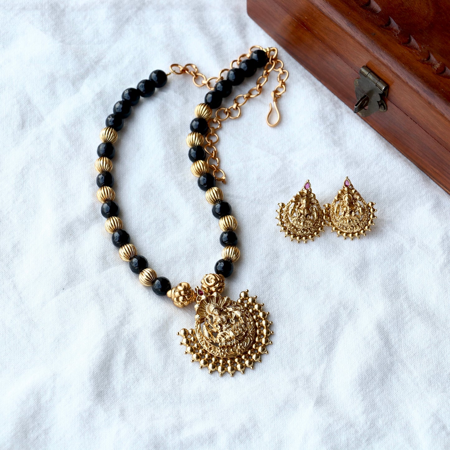 Lakshmi Pendant Black Beads Necklace